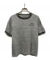 USED（ユーズド）の古着「染み込みカレッジプリントリンガーTシャツ」｜グレー