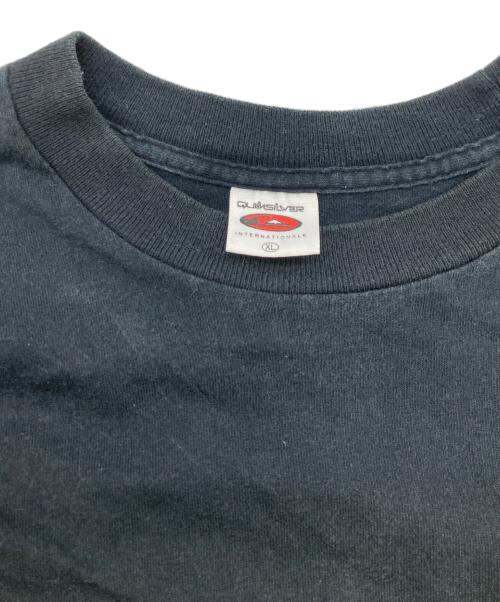 Quiksilver（クイックシルバー）Quiksilver (クイックシルバー) 90s キャラクターロゴTシャツ ブラック サイズ:XLの古着・服飾アイテム