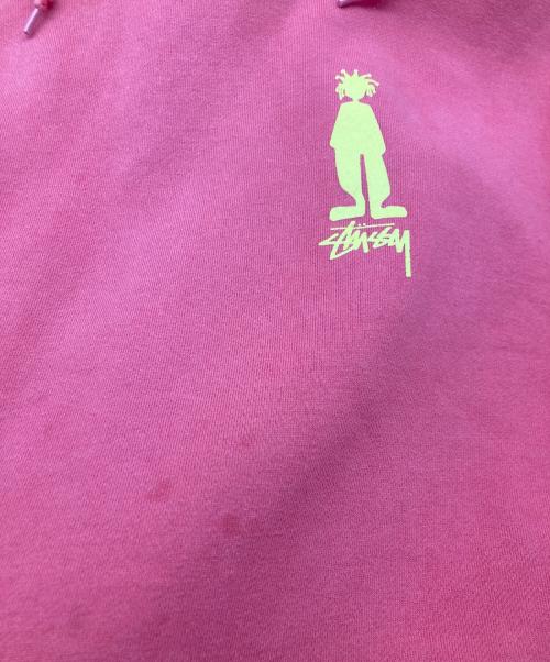 stussy（ステューシー）stussy (ステューシー) シャドウマンプリントパーカー オレンジ サイズ:Mの古着・服飾アイテム