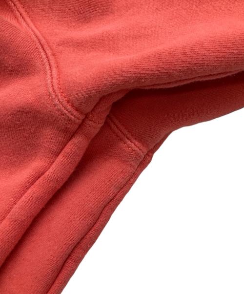 stussy（ステューシー）stussy (ステューシー) シャドウマンプリントパーカー オレンジ サイズ:Mの古着・服飾アイテム