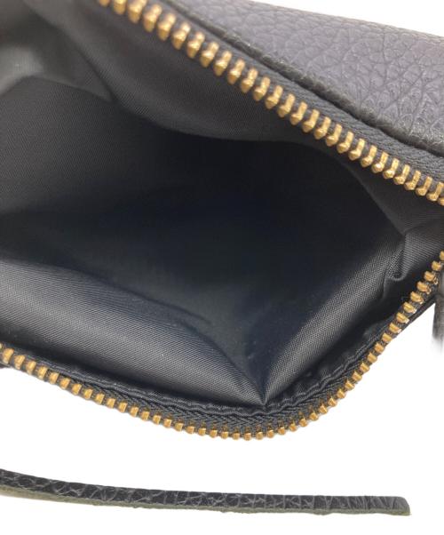 5525gallery（ゴーゴーニーゴーギャラリー）5525gallery (ゴーゴーニーゴーギャラリー) PORTER (ポーター) FRINGE POUCH ブラックの古着・服飾アイテム