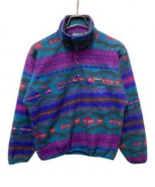 Patagonia（パタゴニア）の古着「サカジャウィア柄 シンチラスナップT」｜パープル