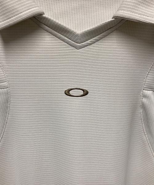 OAKLEY（オークリー）OAKLEY (オークリー) フロントロゴスキッパーカットソー ベージュ サイズ:Mの古着・服飾アイテム