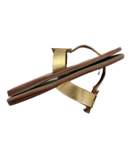 TORY BURCH（トリーバーチ）TORY BURCH (トリーバーチ) フラットサンダル ゴールド×ブラウン サイズ:SIZE 7 1/2 Mの古着・服飾アイテム