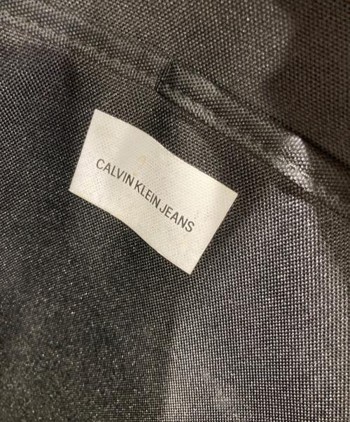 Calvin Klein Jeans（カルバンクラインジーンズ）Calvin Klein Jeans (カルバンクラインジーンズ) 総柄ロゴリュック ブラック サイズ:-の古着・服飾アイテム