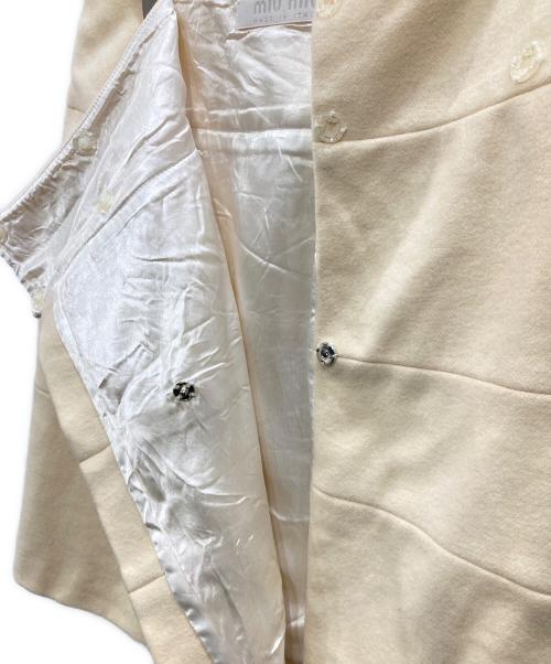 MIU MIU（ミュウミュウ）MIU MIU (ミュウミュウ) ラップスカート アイボリー サイズ:42の古着・服飾アイテム