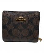 COACHコーチ）の古着「2つ折り財布」｜ブラウン