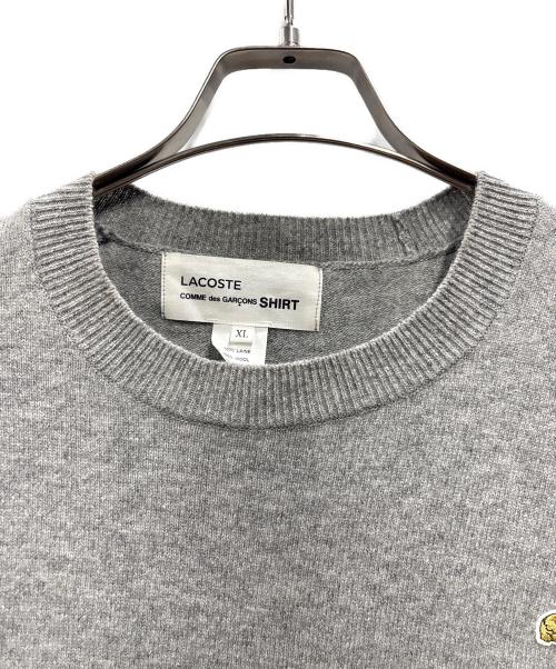 LACOSTE（ラコステ）LACOSTE (ラコステ) COMME des GARCONS SHIRT (コムデギャルソンシャツ) コラボニット グレー サイズ:XLの古着・服飾アイテム