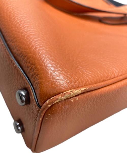 COACH（コーチ）COACH (コーチ) グラハム ストラクチャード ブリーフ オレンジの古着・服飾アイテム