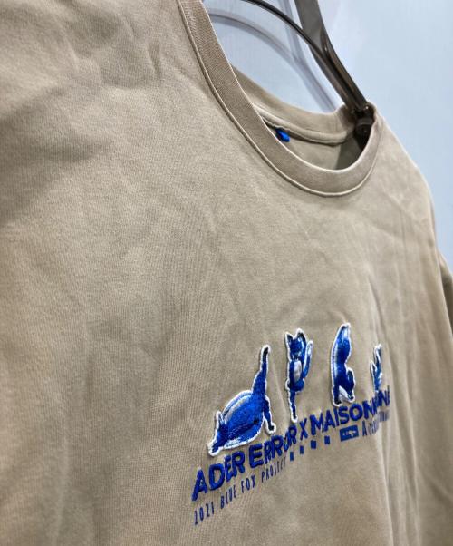 ADER error（アーダーエラー）ADER error (アーダーエラー) MAISON KITSUNE (メゾンキツネ) コラボワッペンカットソー ベージュ サイズ:A3の古着・服飾アイテム