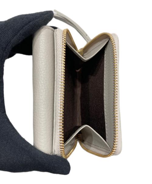 russet（ラシット）russet (ラシット) エンボスモノグラム3つ折り財布 グレーの古着・服飾アイテム