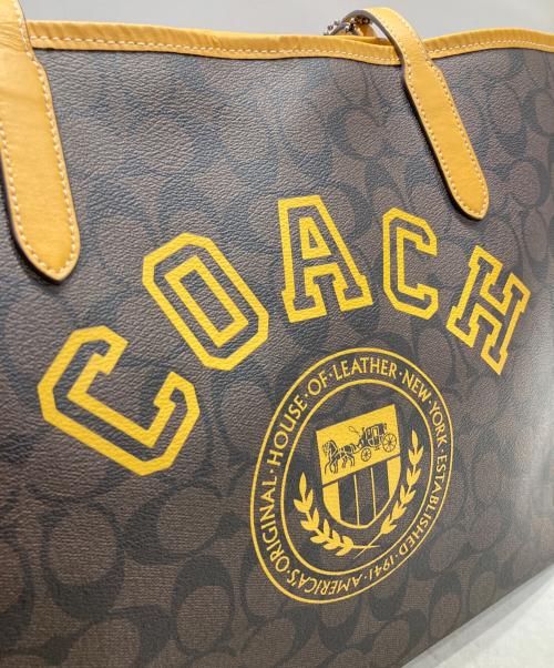COACH（コーチ）COACH (コーチ) シティ トート シグネチャー キャンバス ウィズ ヴァーシティ モチーフ ブラウンの古着・服飾アイテム