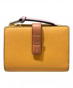 LOEWEロエベ）の古着「スリムジップバイフォールドウォレット」｜イエローピンク