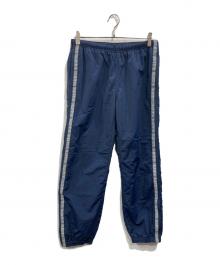 SUPREME（シュプリーム）の古着「Tonal taping track pant」｜ネイビー