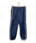SUPREME（シュプリーム）の古着「Tonal taping track pant」｜ネイビー