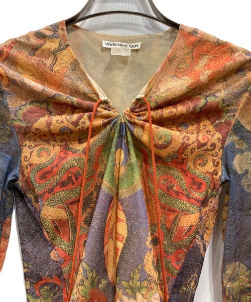 VIVIENNE TAM（ヴィヴィアンタム）VIVIENNE TAM (ヴィヴィアンタム) 仏陀柄長袖カットソー オレンジの古着・服飾アイテム
