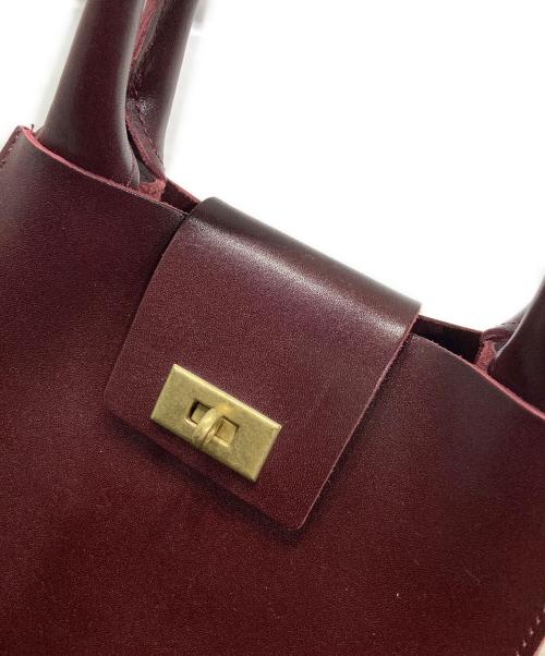 TIDE WAY（タイドウェイ）TIDE WAY (タイドウェイ) MOSS METAL TWIST TOTE ボルドーの古着・服飾アイテム