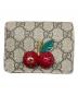 GUCCI（グッチ）の古着「チェリー コンパクトウォレット」｜ベージュ×レッド