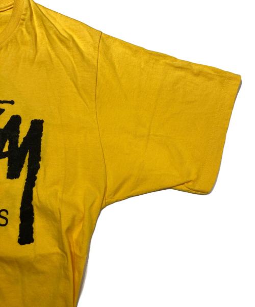 stussy（ステューシー）stussy (ステューシー) WORLD TOUR TEE イエロー サイズ:Mの古着・服飾アイテム