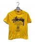 stussy（ステューシー）の古着「WORLD TOUR TEE」｜イエロー