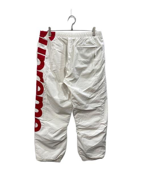 SUPREME（シュプリーム）Supreme (シュプリーム) 21SS SPELLOUT TRACK PANT ホワイト×レッド サイズ:Largeの古着・服飾アイテム