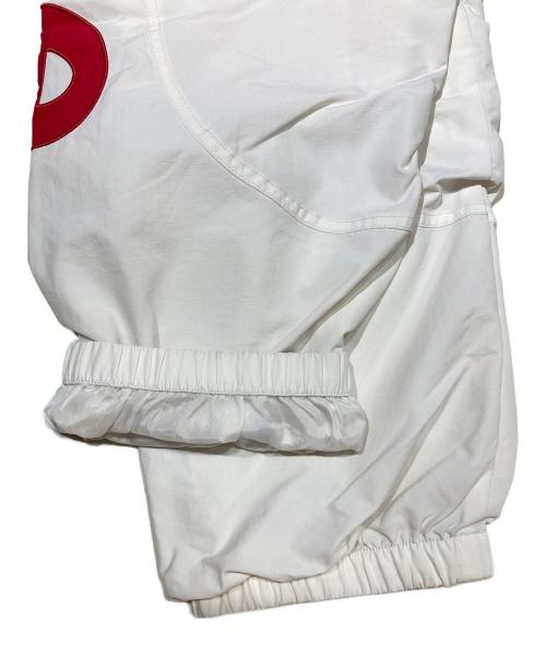 SUPREME（シュプリーム）Supreme (シュプリーム) 21SS SPELLOUT TRACK PANT ホワイト×レッド サイズ:Largeの古着・服飾アイテム