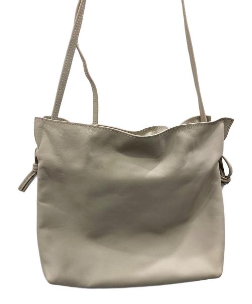 collex（コレックス）collex (コレックス) レザーキンチャクポシェット ベージュの古着・服飾アイテム