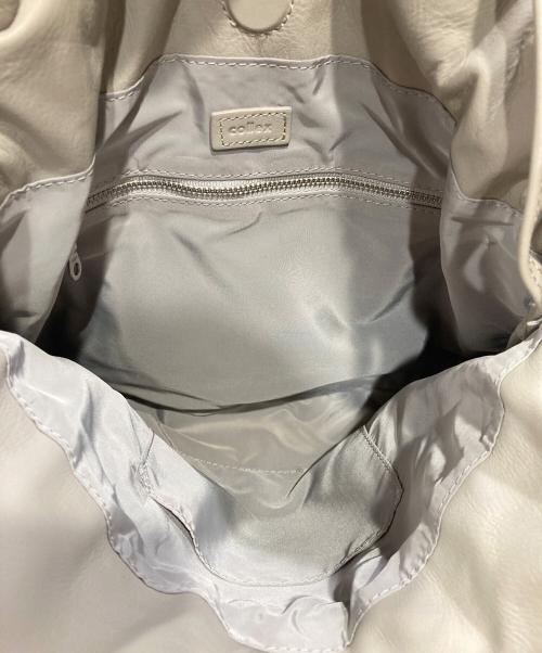 collex（コレックス）collex (コレックス) レザーキンチャクポシェット ベージュの古着・服飾アイテム