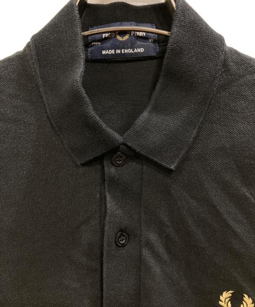 FRED PERRY（フレッドペリー）FRED PERRY (フレッドペリー) ポロシャツ ブラック×ゴールド サイズ:36の古着・服飾アイテム