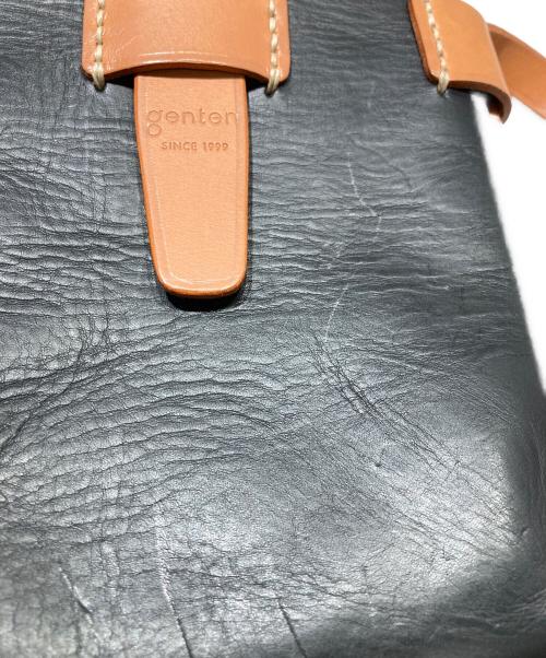genten（ゲンテン）genten (ゲンテン) サドルベルト ヌオーバ 縦型コンパクトショルダーバッグ ブラウン×ブラックの古着・服飾アイテム
