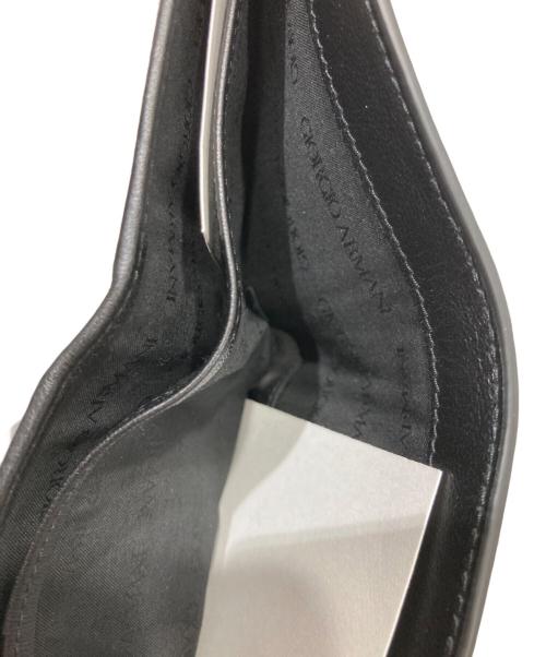 GIORGIO ARMANI（ジョルジオアルマーニ）GIORGIO ARMANI (ジョルジオアルマーニ) ナッパ―レザー二つ折り財布 ブラックの古着・服飾アイテム