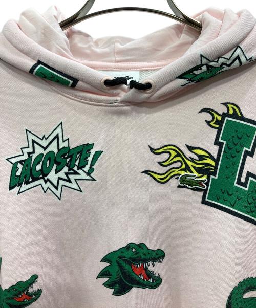 LACOSTE（ラコステ）LACOSTE (ラコステ) オールオーバーシーズナルグラフィックプリントフードスウェット ピンク サイズ:34の古着・服飾アイテム