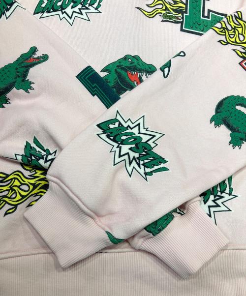LACOSTE（ラコステ）LACOSTE (ラコステ) オールオーバーシーズナルグラフィックプリントフードスウェット ピンク サイズ:34の古着・服飾アイテム