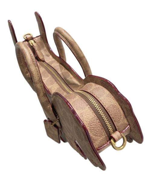 COACH（コーチ）COACH (コーチ) REXY レキシー バッグ・シグネチャー キャンバス ブラウンの古着・服飾アイテム