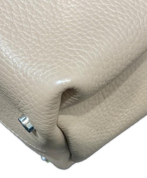 TOD'S（トッズ）TOD'S (トッズ) Tタイムレス 2WAY ハンドバッグ ベージュ×バーガンディの古着・服飾アイテム