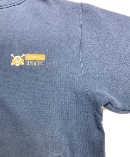 stussy（ステューシー）stussy (ステューシー) STUSSY TRIBE スカルロゴフーディ ネイビー サイズ:Xlargeの古着・服飾アイテム