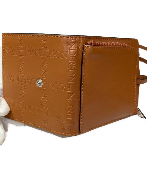 J.W.ANDERSON（ジェイダブリューアンダーソン）J.W.ANDERSON (ジェイダブリューアンダーソン) ストラップミニウォレット ブラウンの古着・服飾アイテム