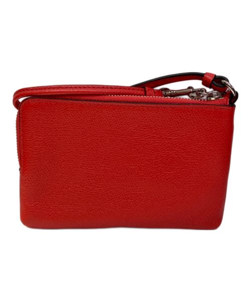 COACH（コーチ）COACH (コーチ) ダブルジップハンドポーチ オレンジの古着・服飾アイテム