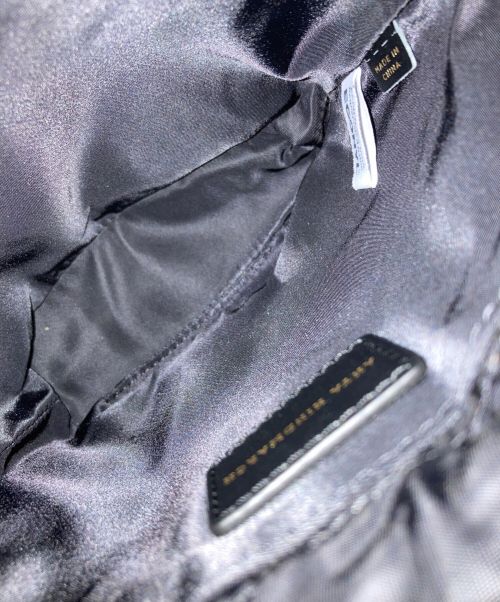 ANYA HINDMARCH（アニヤ・ハインドマーチ）ANYA HINDMARCH (アニヤハインドマーチ) 巾着ポーチ ブラックの古着・服飾アイテム