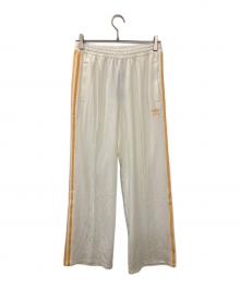 adidas（アディダス）の古着「プレミアム オリジナルス クレープ トラックスーツパンツ」｜ホワイト×イエロー