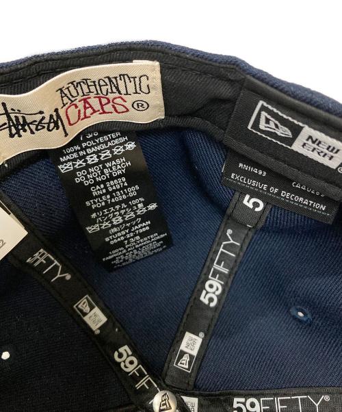 stussy（ステューシー）stussy (ステューシー) New Era (ニューエラ) NYロゴベースボールキャップ ネイビー サイズ:7 3/8　(58.7cm)の古着・服飾アイテム