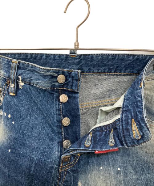 DSQUARED2（ディースクエアード）DSQUARED2 (ディースクエアード) ペイントダメージデニムパンツ インディゴ サイズ:48の古着・服飾アイテム