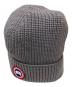CANADA GOOSE（カナダグース）の古着「ロゴワッペンニット帽」｜グレー
