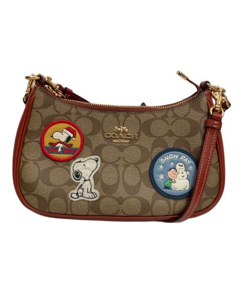 COACH（コーチ）COACH (コーチ) PEANUTS (ピーナッツ) テリ ショルダー バッグ・シグネチャー キャンバス・パッチ ブラウンの古着・服飾アイテム