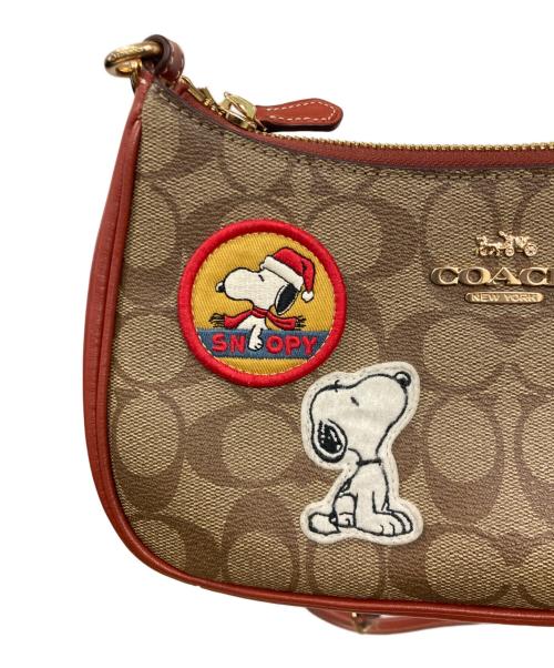 COACH（コーチ）COACH (コーチ) PEANUTS (ピーナッツ) テリ ショルダー バッグ・シグネチャー キャンバス・パッチ ブラウンの古着・服飾アイテム