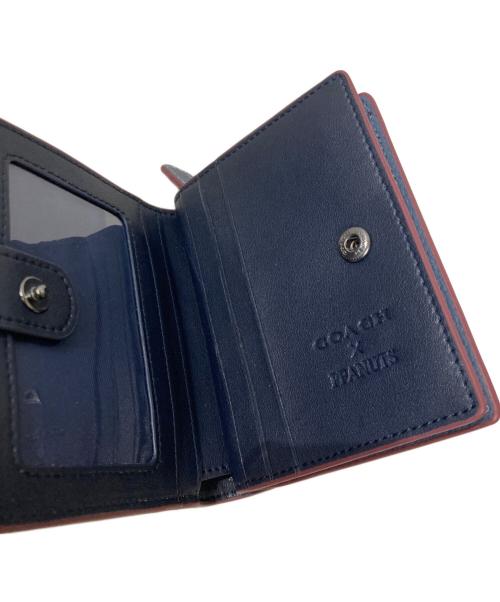 COACH（コーチ）COACH (コーチ) PEANUTS (ピーナッツ) スナップ ウォレット・スヌーピー スキー モチーフ ネイビーの古着・服飾アイテム