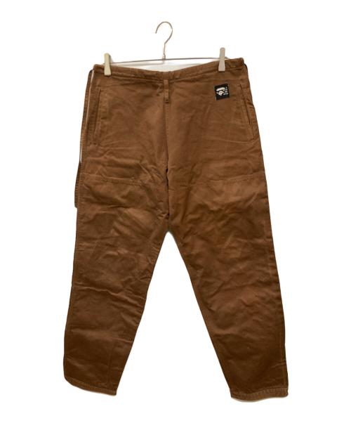 A BATHING APE（ア ベイシング エイプ）A BATHING APE (ア ベイシング エイプ) 古着プリントワークパンツ ブラウン サイズ:Mの古着・服飾アイテム