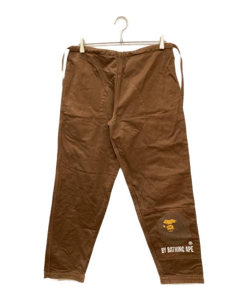 A BATHING APE（ア ベイシング エイプ）A BATHING APE (ア ベイシング エイプ) 古着プリントワークパンツ ブラウン サイズ:Mの古着・服飾アイテム