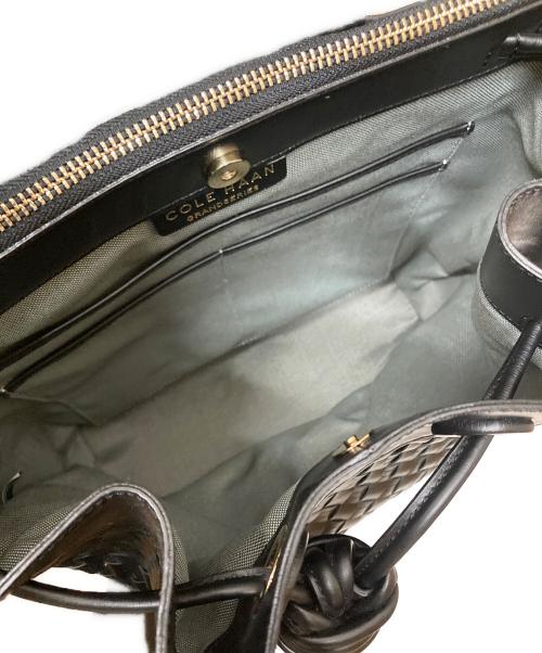 COLE HAAN（コールハーン）COLE HAAN (コールハーン) ウォーブン レザー ドローストリングリュック ブラックの古着・服飾アイテム