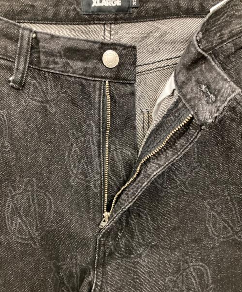 X-LARGE（エクストララージ）X-LARGE (エクストララージ) ALLOVER CIRCLE XL DENIM PANTS ブラック サイズ: 81cm (W32)の古着・服飾アイテム